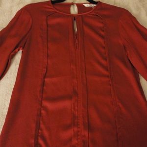 red silk blouse